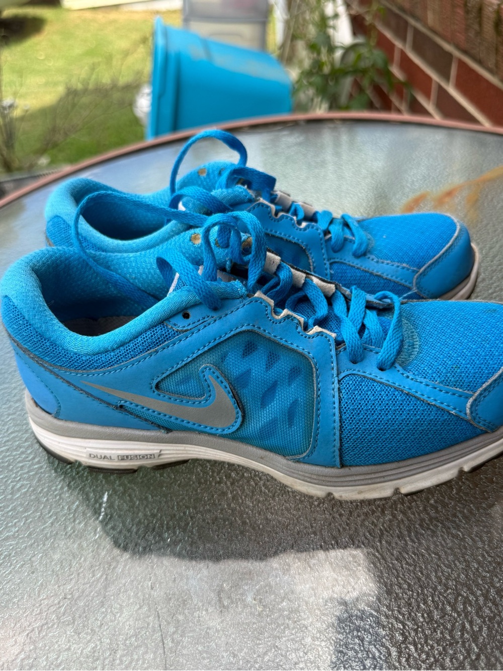 Nike Men’s Blue Athletic Sneakers with Silver Swoosh